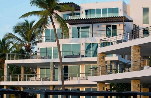 El Batey Apartment | 4BD groundfloor condo, pure beachfront, gym/pool/high-speed internet/cable TV
