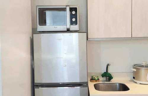 Taguig House | 4pax 1BR Cozy Apartment w/View and Balcony