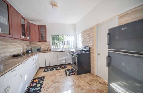 El Batey House | 7BR Villa next to Playa Chiquita Casino!