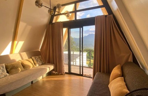 Mataas Na Kahoy House | A-Frame Cabin with Taal Lake View and Hot Tub