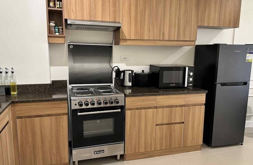 Forbes Park Condo | Aesthetic 2BR stay near BGC + Airport