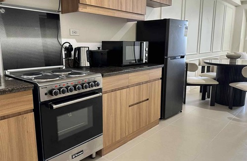 Forbes Park Condo | Aesthetic 2BR stay near BGC + Airport