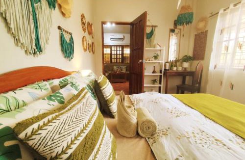 San Pedro Bed & Breakfast | Amwani Garden Pool & Kubo Tent Rental