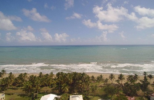 Cabarete Apartment | Apartment steps from a quiet surfing beach, pool/TV/Wi-fi/AC