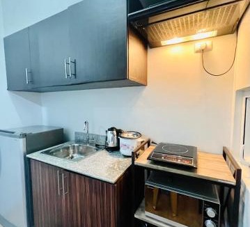 Muntinlupa Apartment | At Home Condo With Free Pool Access
