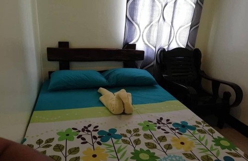 Guindulman House | Balai Mariacaria Pension House