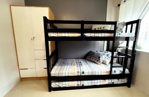 Project 8 Apartment | Bali Theme Near SM North Trinoma LRT Roosevelt Netflix Fast Internet
