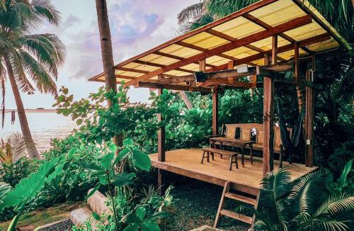 Catangnan House | Beachfront Private Bungalow