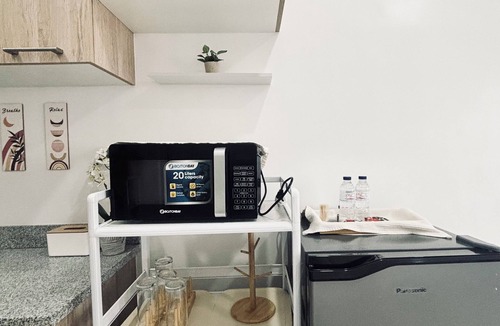 Mandurriao Condo | Bright & Airy Urban Escape