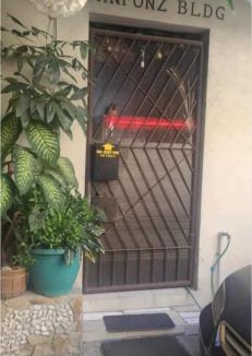 Quezon City House | Budget Staycation JOHNFONZ Building Aircondition Room