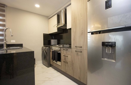 Serralles Apartment | Céntrico con Piscina+bbq+gym+espacio de Trabajo y Personal en el Lobby 24/7