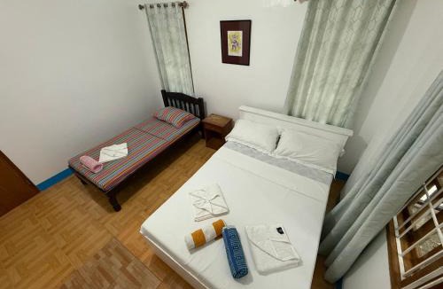 Dauis House | Casa Aureola