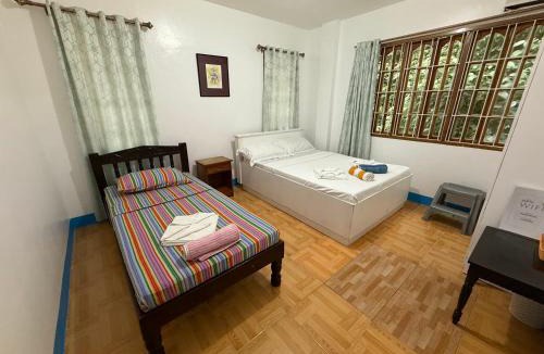 Dauis House | Casa Aureola
