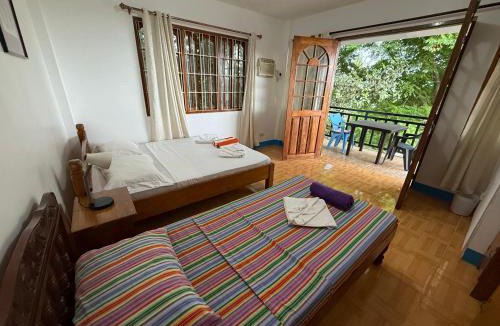 Dauis House | Casa Aureola