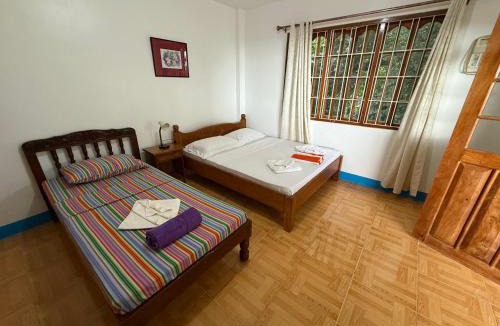Dauis House | Casa Aureola