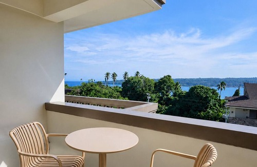 Kaputian Condo | CASA CHOY SUITES at Kembali Coast with Balcony Island Escape Pool & Beach Access