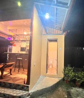 San Pedro House | Casa La Princesa 1 Family Room with cozy balcony & kitchen