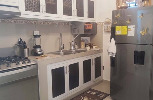 San Victor Apartment | Charming 2-bedroom apartment in San Victor Espaillat, with AC , JacuzziBackyard