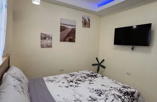 Compostela Bed & Breakfast | Charming Bed & Breakfast Room #1 with WiFi and AC in Delightful Compostela Cebu