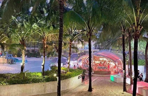 Taguig Condo | Chic 2-bedroom condo with AC, WiFi in enchanting Parañaque