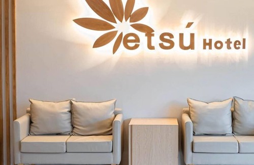 Downtown Tacloban Apartment | Chic Comforts: Etsu Hotel's Signature Studio Await