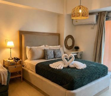 Pinagsama Apartment | Chic & Cozy Studio with Balcony by Venice Canal BGC