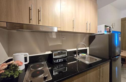 Highway Hills Hotel | Citispace 1BR Condotel Suite at FAME Residences #FM64A