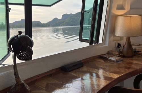 Air Hangat Boat Rental | Coconest ONE: Floating Couple Unit Waterstay on a UNESCO Site