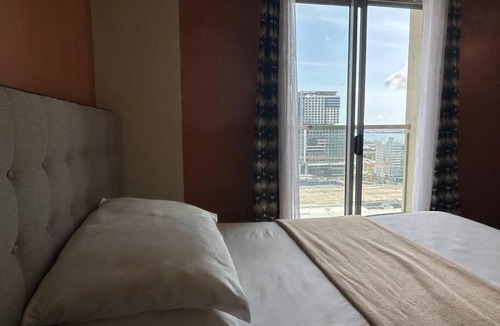 North Reclamation Area Apartment | Condo with Balcony - MIGAs Haven at Sunvida Tower