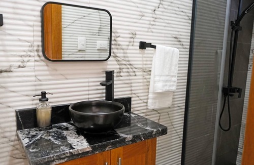 Barrio Las Yaguitas Apartment | Cozy 1-bedroom apartment in tranquil Puerto Plata with WiFi, AC
