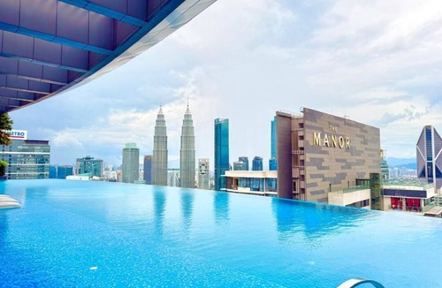 Golden Triangle Apartment | Cozy 1-bedroom apartment in beautiful Kuala Lumpur with AC and gym access