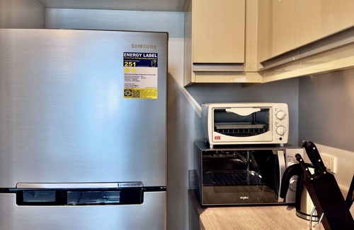 Legazpi Village Condo | Cozy 1-Bedroom with Balcony Condo near Greenbelt Mall Makati City