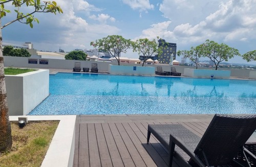 San Dionisio Apartment | Cozy 2 Bedroom Condo Apartment in Batam. Next to HarbourBay Ferry Terminal. Pool