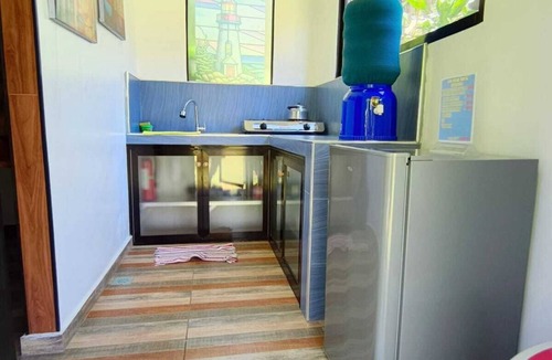 Mambajao House | Cozy 2-bedroom house in welcoming Mambajao with AC