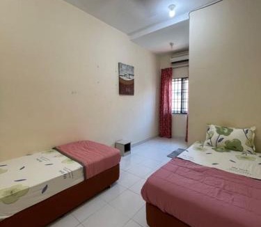 Kampung Telaga Batin Apartment | Cozy Family Stay Near Beach, Airport & Stadium