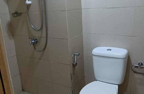 Santo Cristo Condo | Cozy High-Rise Haven