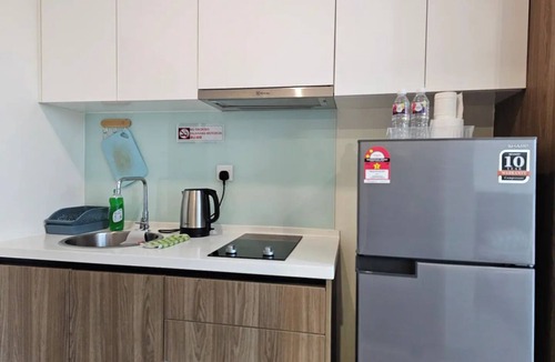 Batu Lintang House | Cozy Home 2 @Kozi Square near General Hospital