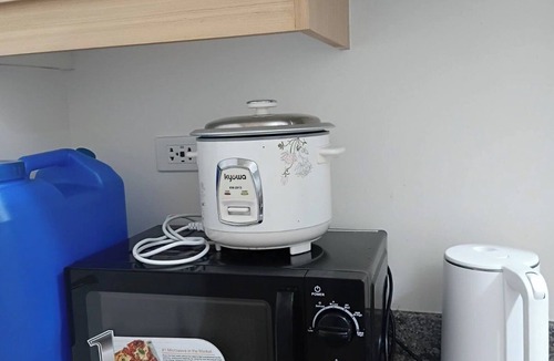 Project 4 Apartment | Cozy QC Condo w/Karaoke, Pool & Fast Wi-Fi