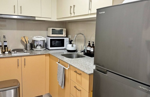 Bonifacio Global City Condo | Cozy Scandinavian Luxe 1BR with Balcony and Parking