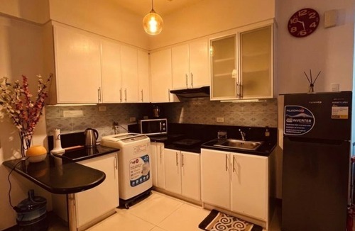 Pinagsama Condo | Cozy Studio near NAIA and Venice Grand Canal Mall - FAST WIFI