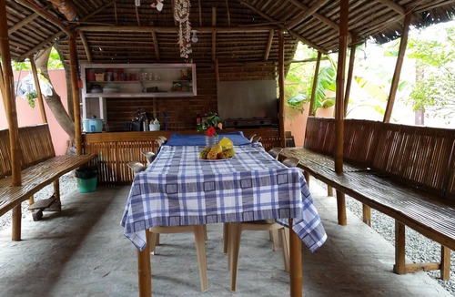 Roxas Cottage | Cute, cool Green Kubo near the beach