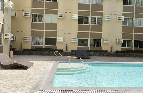 Binan City Condo | Deluxe Studio - Fast WiFi, 55" UHD TV with Netflix & Prime Video, Free Pool