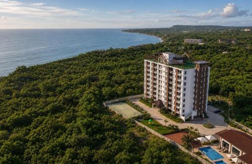 Dauis Apartment | DG Coastal Comfort near Alona Beach - Pool, Gym and Play area