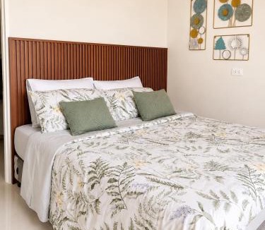 Dauis Apartment | DG Coastal Comfort near Alona Beach - Pool, Gym and Play area