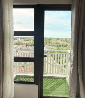 Dauis Apartment | DG Coastal Comfort near Alona Beach - Pool, Gym and Play area