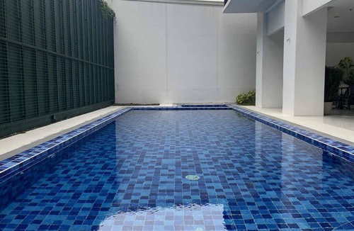 Pallocan Condo | Discover Comfort in the City - Cozy 1 Bedroom Condo Awaits