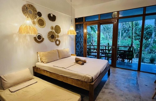 Catangnan Apartment | Discover the Serenity of Our Peaceful Homestay in Siargao