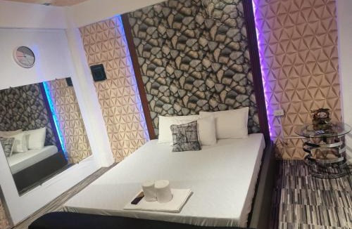 Cabanatuan Apartment | DJCI Apartelle Walk to Robinson & NE Pacific Mall 3 Min to SM Cabanatuan