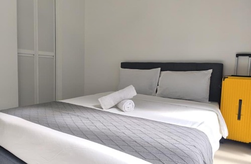 Medini Apartment | DP Cozy Family-Friendly 2BR Retreat By STAY