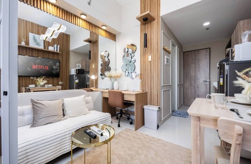 Lapu-Lapu Apartment | Elegant Wood-Accent Studio with Balcony